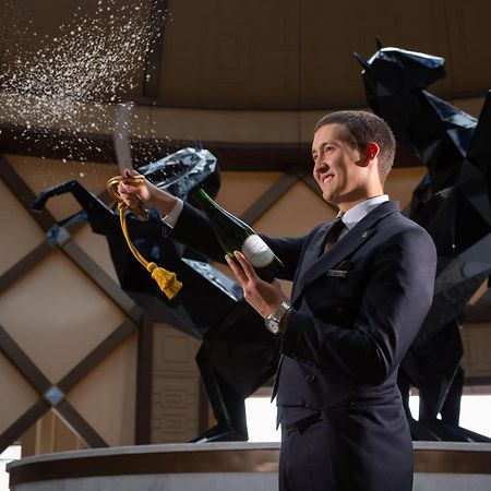 The St. Regis Astana Hotel Luaran gambar A butler at the Atlantis Resort, Bahamas