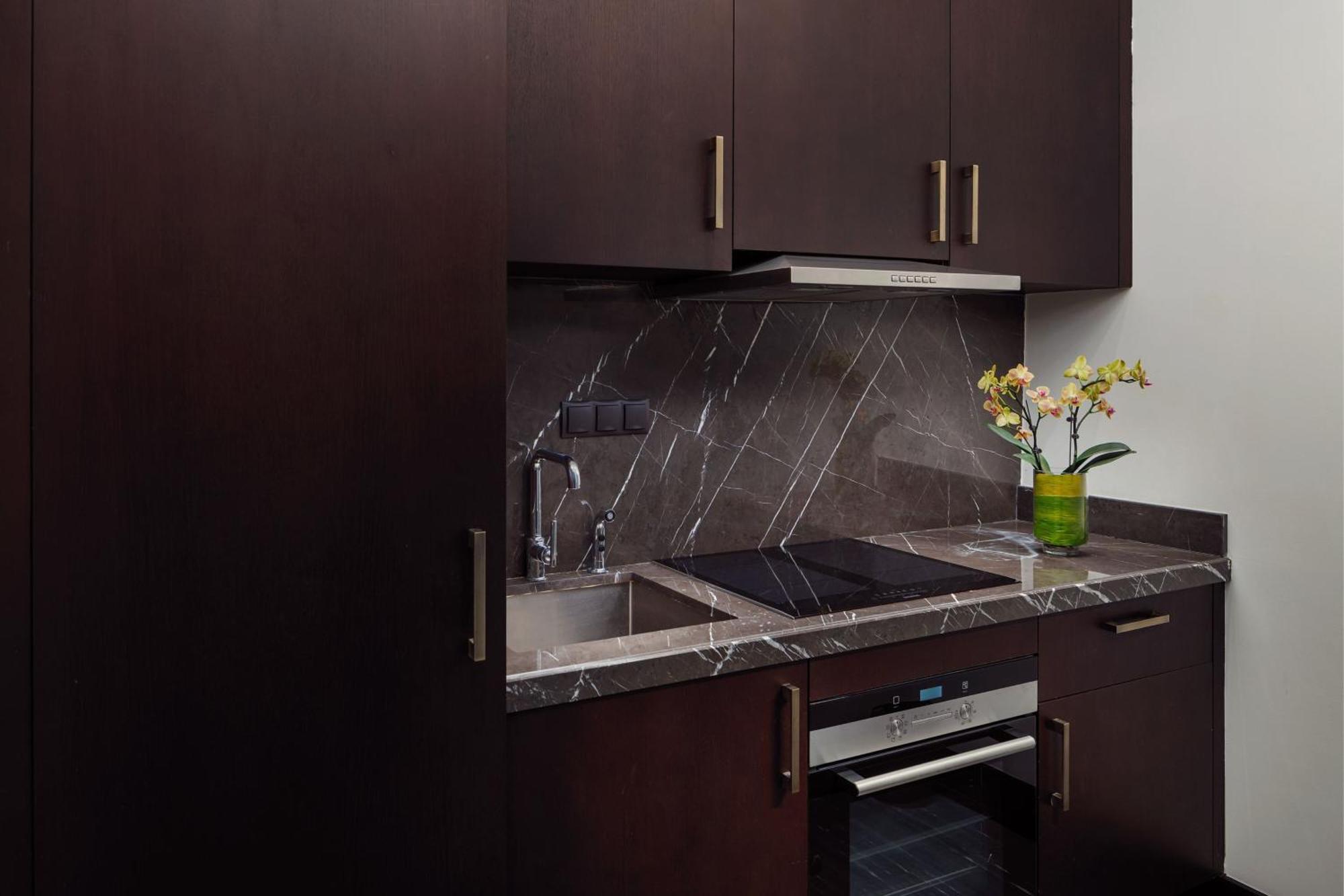 The St. Regis Astana Hotel Luaran gambar A kitchen in a typical apartment